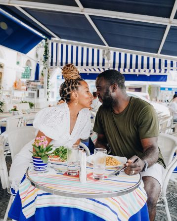 <strong>Traveling together: </strong>The two enjoyed traveling together from the get-go. Here they are pictured at dinner on the Amalfi Coast, Italy.