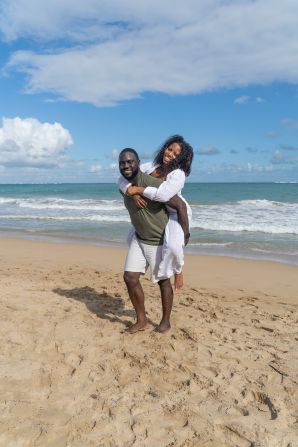 <strong>Hanging out:</strong> "It was very easy," says Martina. "There were no gray areas. We liked each other, and we hung out, we spent time together." Here's the couple photographed on a beach in Puerto Rico.