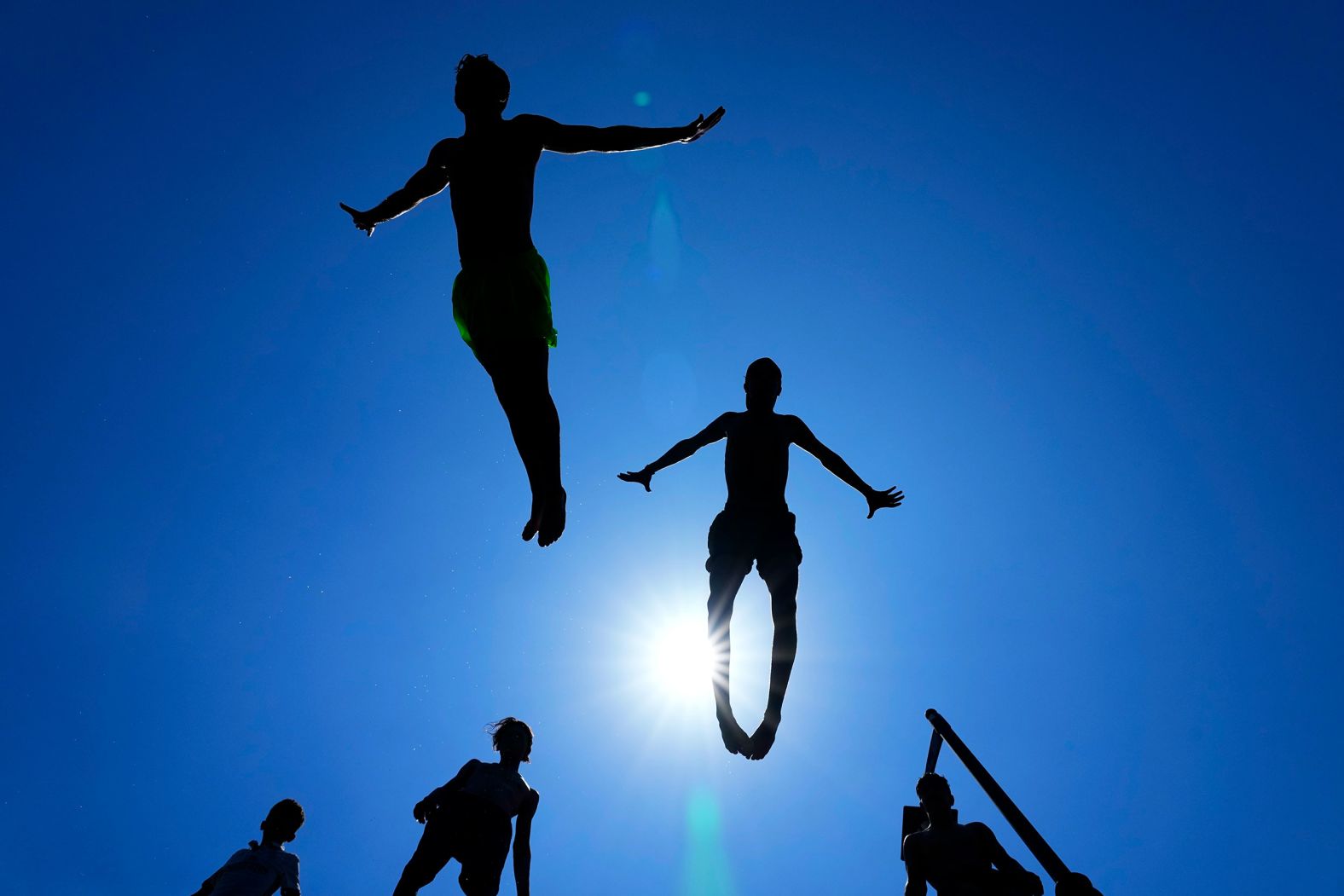 Young people jump into the Mediterranean Sea to cool down on a sweltering hot day in Beirut, Lebanon, on Sunday, July 23. Scientists from two global climate authorities have reported that <a href="https://www.cnn.com/2023/07/27/world/july-hottest-month-record-climate/index.html" target="_blank">July will be the planet's hottest on record by far</a>.