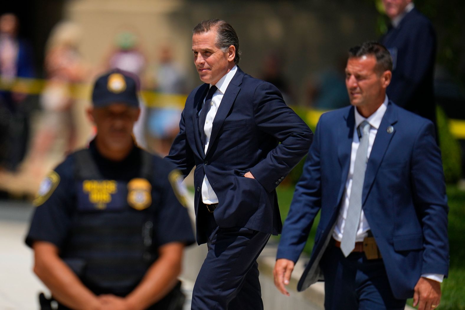 Hunter Biden, son of US President Joe Biden, leaves after a court appearance in Wilmington, Delaware, on Wednesday, July 26. A plea deal between him and the Justice Department is on hold after <a href="https://www.cnn.com/2023/07/26/politics/hunter-biden-plea-hearing/index.html" target="_blank">Wednesday's dramatic court hearing</a>. Hunter Biden failed to pay between $1.1 million and $1.5 million in federal taxes before the legal deadlines, and he was poised to plead guilty to two tax charges with prosecutors agreeing to recommend a sentence of probation. But before the original plea could be entered, the deal began to unravel and a revised agreement reached during the hearing was not accepted by the judge.