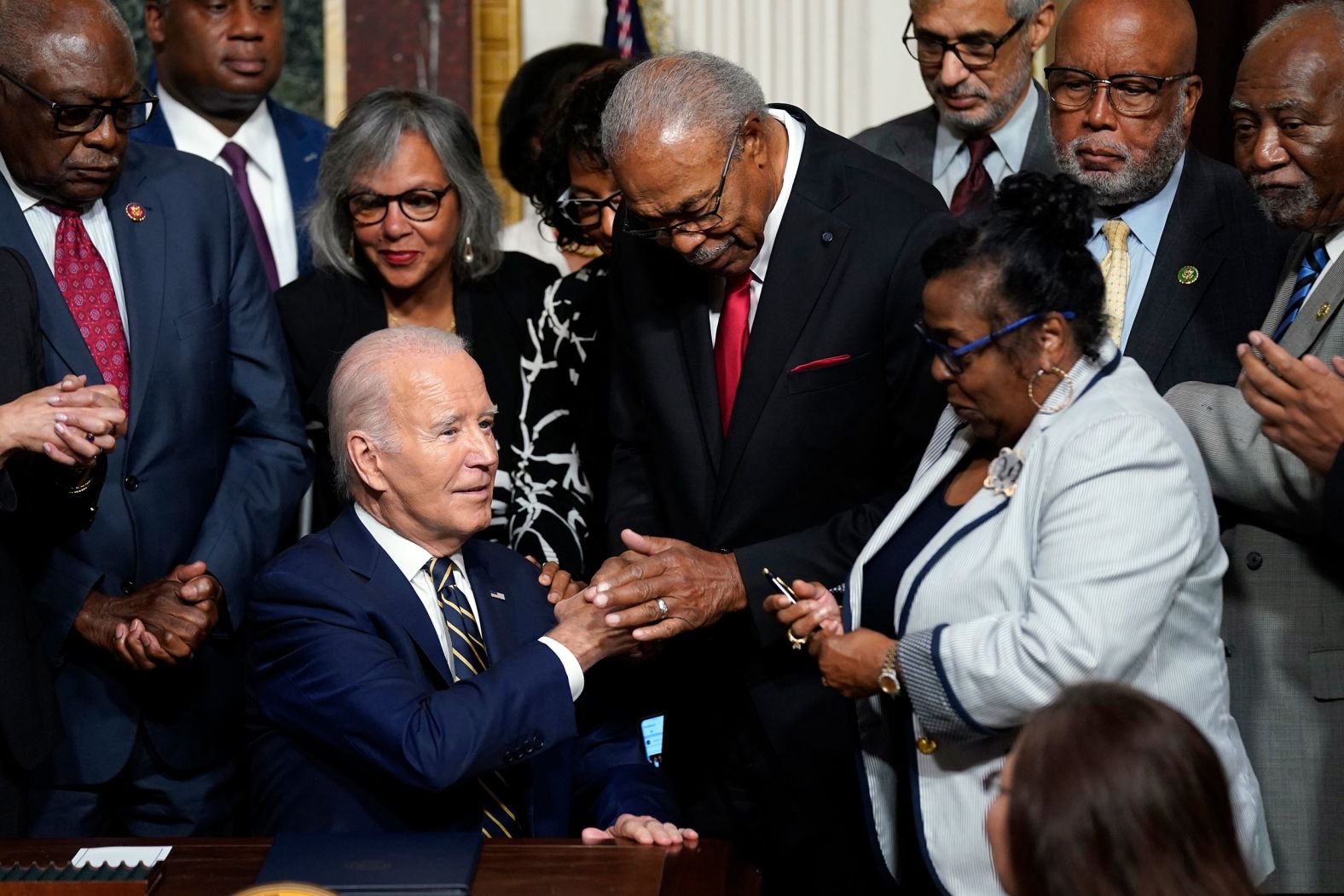 US President Joe Biden shakes hands with the Rev. Wheeler Parker on Tuesday, July 25, after <a href="https://www.cnn.com/2023/07/25/politics/joe-biden-emmett-till/index.html" target="_blank">signing a proclamation</a> to name a new national monument after Emmett Till, the Black teenager whose murder in 1955 helped galvanize the civil rights movement.