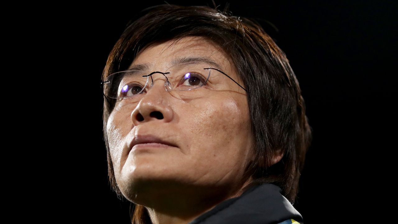 China's head coach Shui Qingxia looks on during her team's first World Cup match on Saturday. 