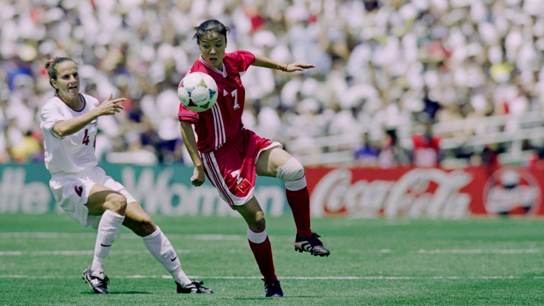 China's Zhang Ouying and Carla Overbeck for America compete during the final of the 1999 World Cup at the Rose Bowl in Pasadena, California.