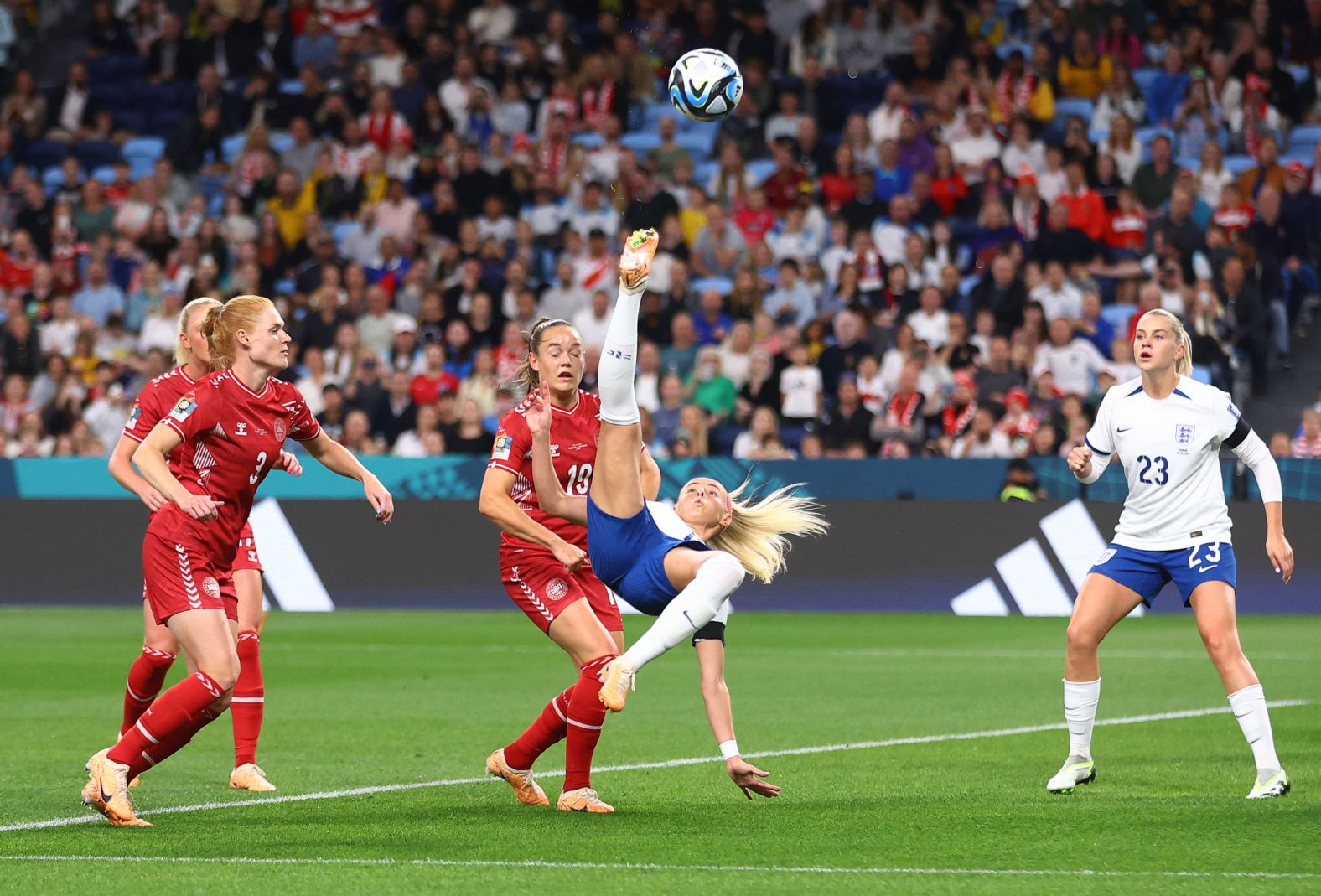England's Chloe Kelly attempts a bicycle kick versus Denmark on July 28. <a href="index.php?page=&url=https%3A%2F%2Fwww.cnn.com%2F2023%2F07%2F27%2Ffootball%2Fengland-argentina-china-womens-world-cup-spt-intl%2Findex.html" target="_blank">England won 1-0</a>.