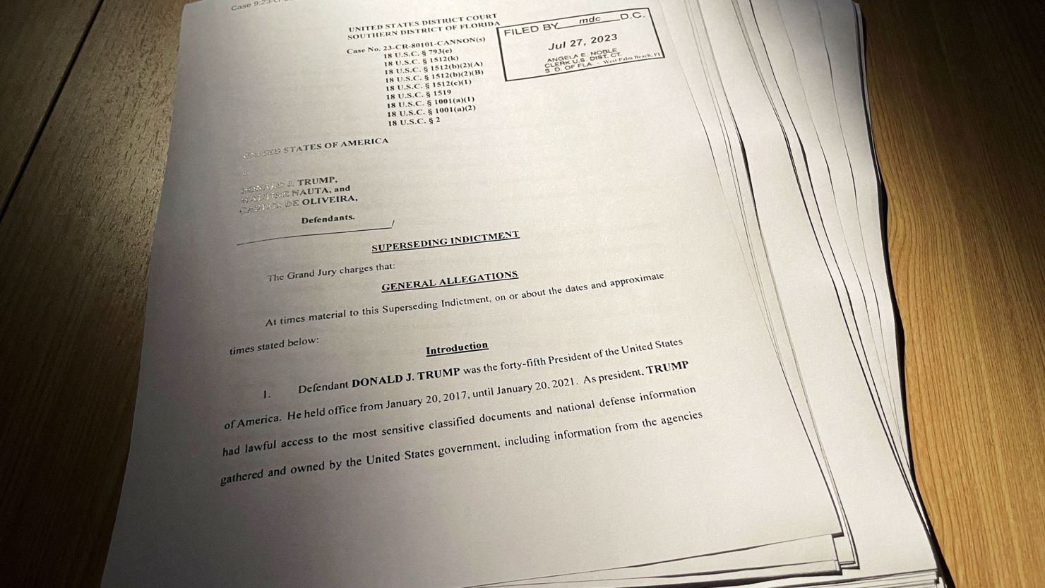 A copy of a superseding indictment is seen in a photo illustration in Washington on July 27, 2023.
