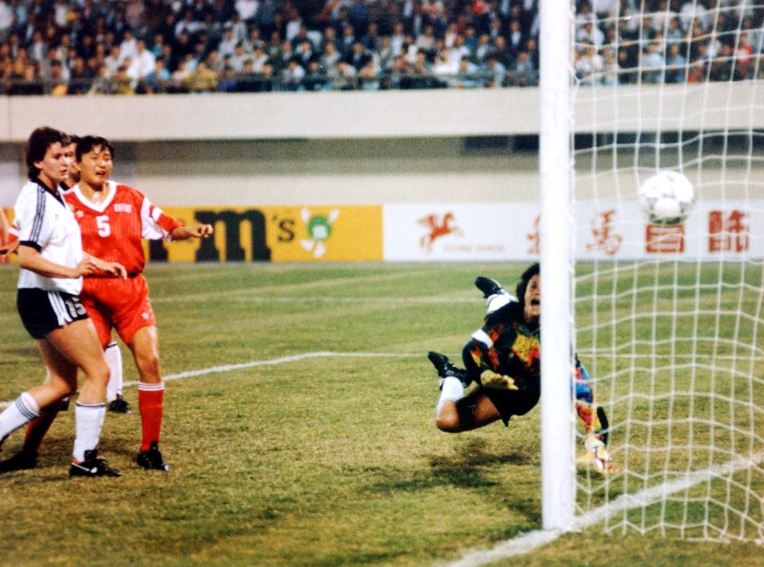 China scores against New Zealand during a group match at the 1991 Women's World Cup in Guangzhou. 