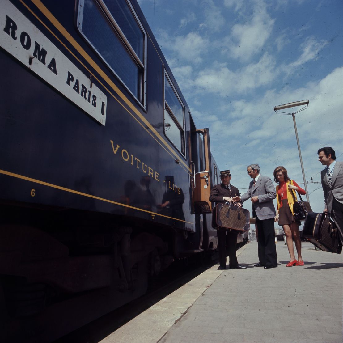 Tourists have been enjoying railway vacations for decades -- like these travelers in 1971.