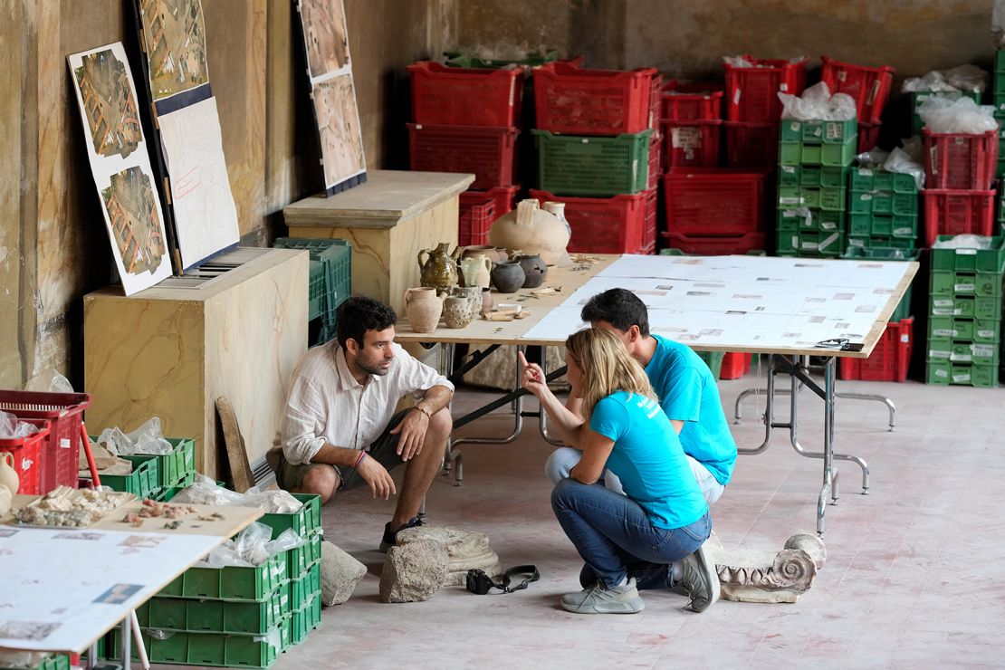 Archaeologists work on findings coming from the excavation site of the ancient Roman emperor Nero's theater.