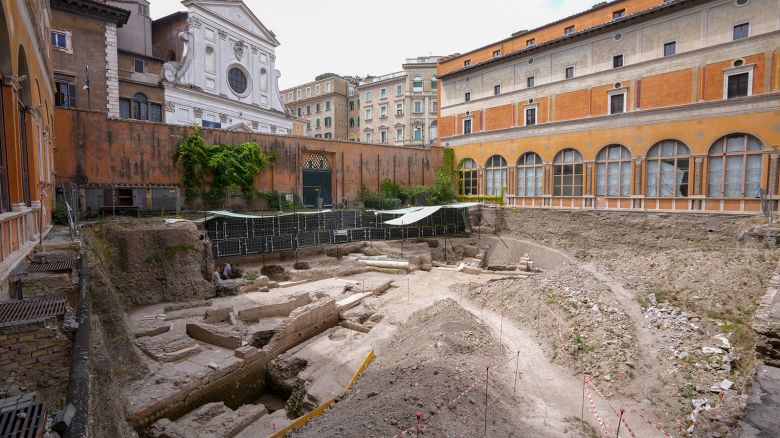 People walk in the excavation site of the ancient Roman emperor Nero's theater.