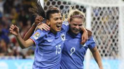 France's Eugenie Le Sommer, right, is congratulated by teammate Kenza Dali after scoring their first goal during the Women's World Cup Group F soccer match between France and Brazil in Brisbane, Australia, Saturday, July 29, 2023. (AP Photo/Tertius Pickard)