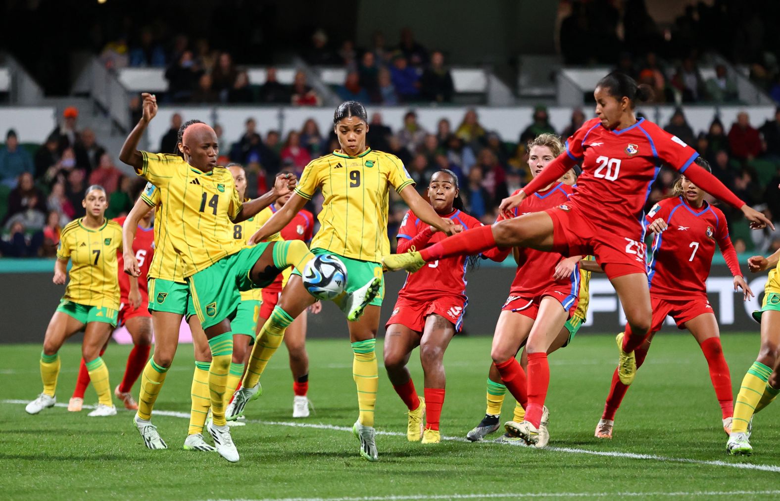 Panama's Aldrith Quintero, right, reaches for the ball in front of Jamaica's Deneisha Blackwood and Kameron Simmonds on July 29. <a href="index.php?page=&url=https%3A%2F%2Fwww.cnn.com%2F2023%2F07%2F29%2Ffootball%2Fjamaica-panama-womens-world-cup-2023-spt-intl%2Findex.html" target="_blank">Jamaica won 1-0</a>. It was Jamaica's first-ever win at a Women's World Cup.