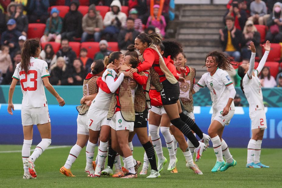 Moroccan players celebrate their 1-0 win over South Korea on July 30.  