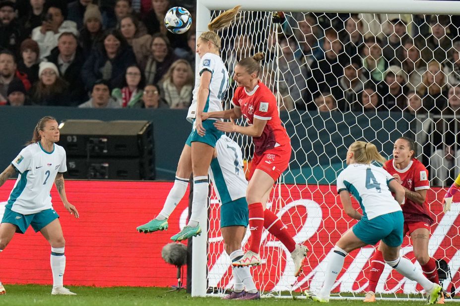 Bowen clears the ball in front of Switzerland's Julia Stierli.