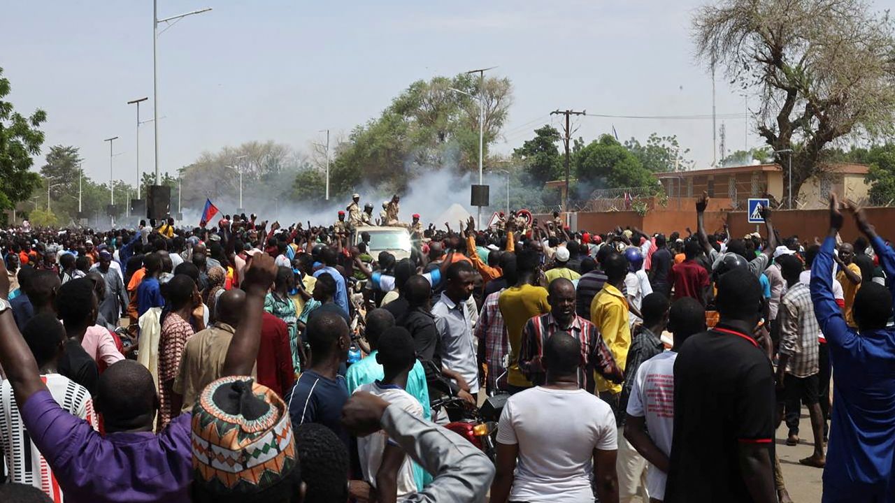 Security forces launch tear gas to disperse pro-junta demonstrators gathered outside the French embassy, in Niamey, the capital city of Niger, on Sunday.