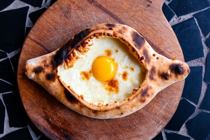 <strong>Khachapuri: </strong>Another take on dough topped with savory goodness, khachapuri is a filling meal in Georgia and Armenia. 