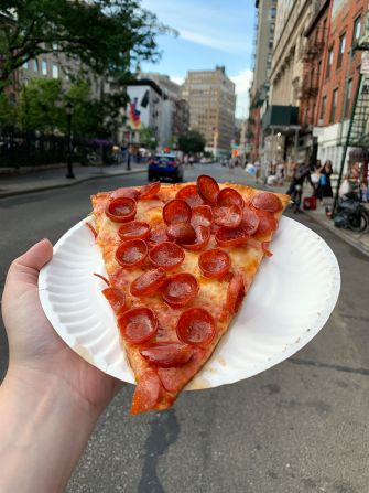 <strong>New York slice pizza:</strong> Fold and go. That's how New Yorkers eat their pizza by the slice.