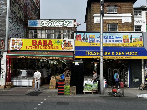 If you exit London's Peckham Rye railway station and head onto the busy Rye Lane (pictured), you'll be met with a flurry of activity on this bustling high street.