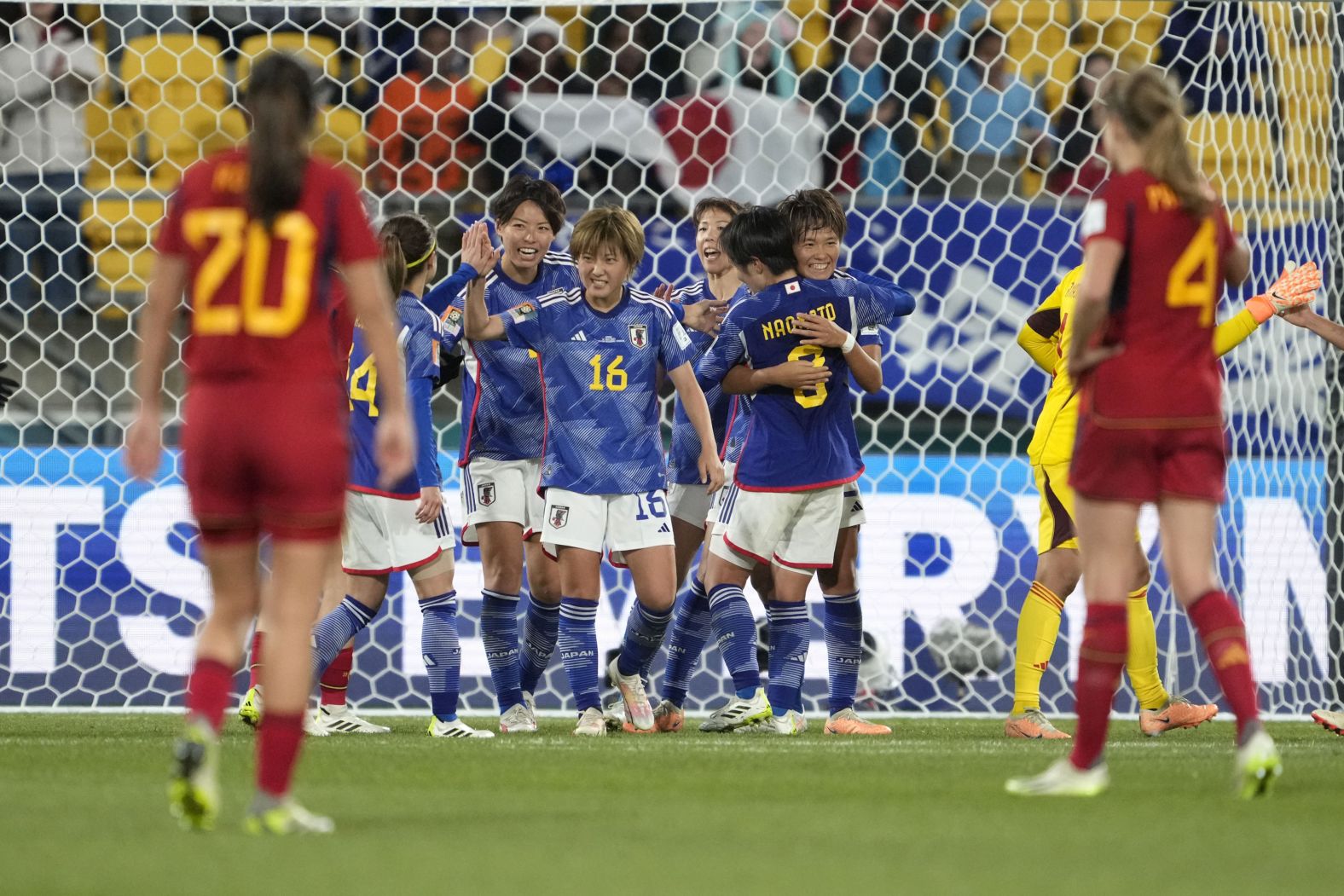 Japanese players celebrate at the end of their <a href="index.php?page=&url=https%3A%2F%2Fedition.cnn.com%2F2023%2F07%2F30%2Ffootball%2Fnigeria-canada-australia-womens-world-cup-spt-intl%2Findex.html" target="_blank">4-0 victory over Spain</a> on July 31. Both teams are advancing to the round of 16.