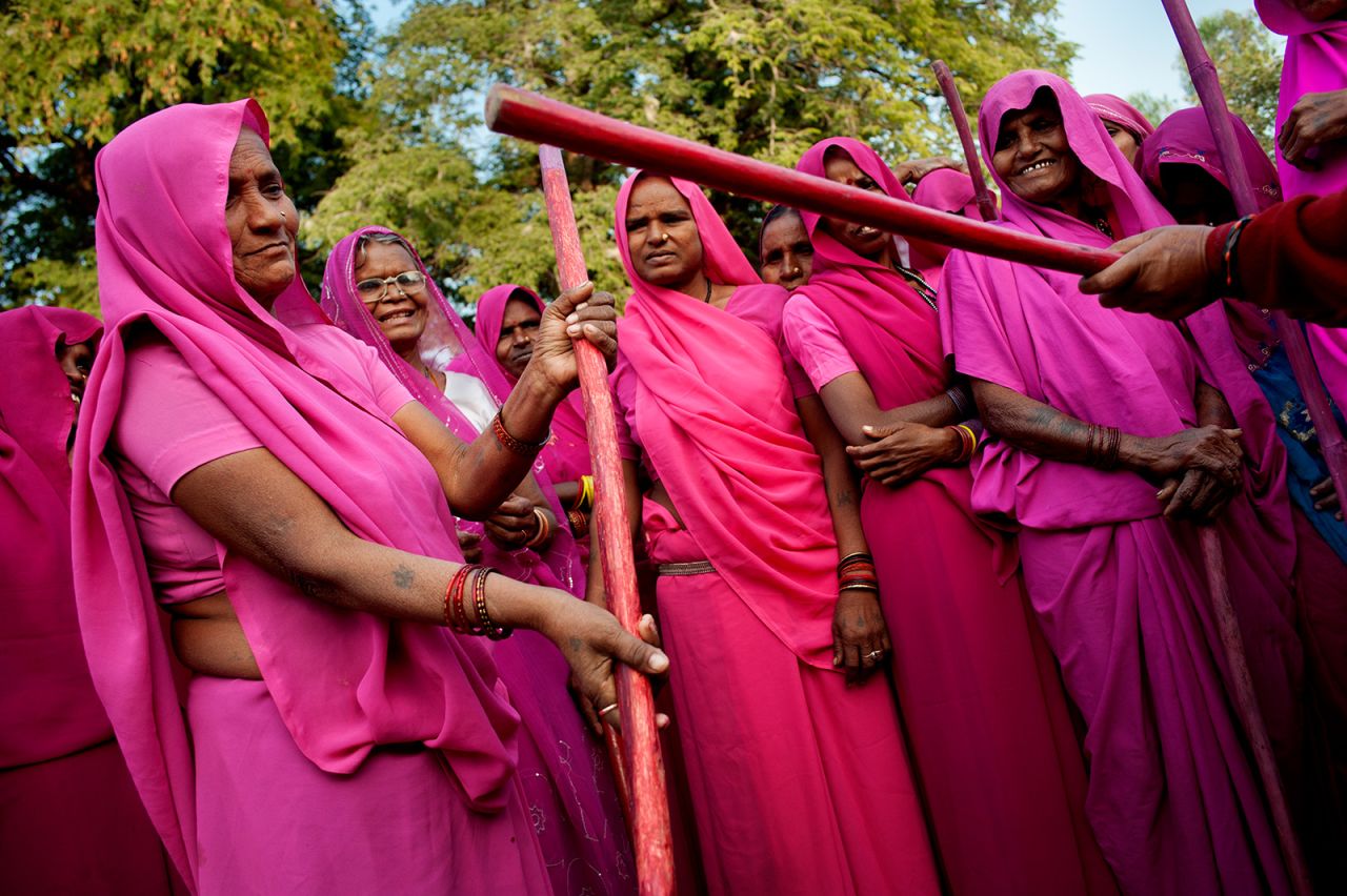 UTTAR PRADESH, INDIA - 2011/12/10: Members of Gulabi Gang put their newly learned skills into actions.

The Gulabi gang, or "the pink gang" as in direct translation from Hindi, is a group of women who basically take justice in their own hands. Out of desperation in the government officials' incompetency in dealing with abusive and domestic violence, Sampat Pal Devi forms the Gulabi Gang. Its main purpose is to help promote better living conditions for women around India. After being in operation for more than half a decade, the Gulabi Gang is reported to have more than 20,000 members and has saved thousands of women's lives across the country.. (Photo by Jonas Gratzer/LightRocket via Getty Images)