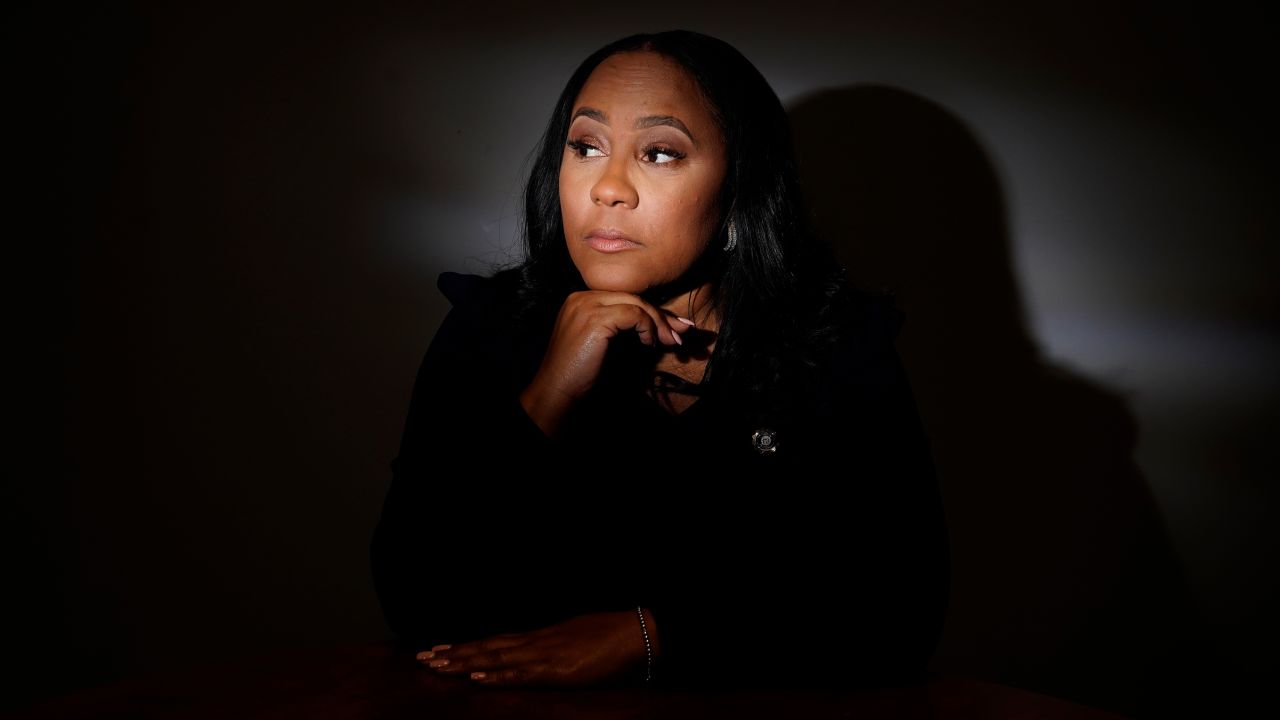 FILE - Fulton County District Attorney Fani Willis poses for a portrait, Wednesday, April 19, 2023, in Atlanta. Willis is expected to seek a grand jury indictment in the coming weeks in her investigation into efforts by Donald Trump and his allies to overturn the former president's 2020 election loss. Willis began investigating more than two years ago, shortly after a recording was released of a January 2021 phone call Trump made to Georgia's secretary of state. (AP Photo/Brynn Anderson, File)