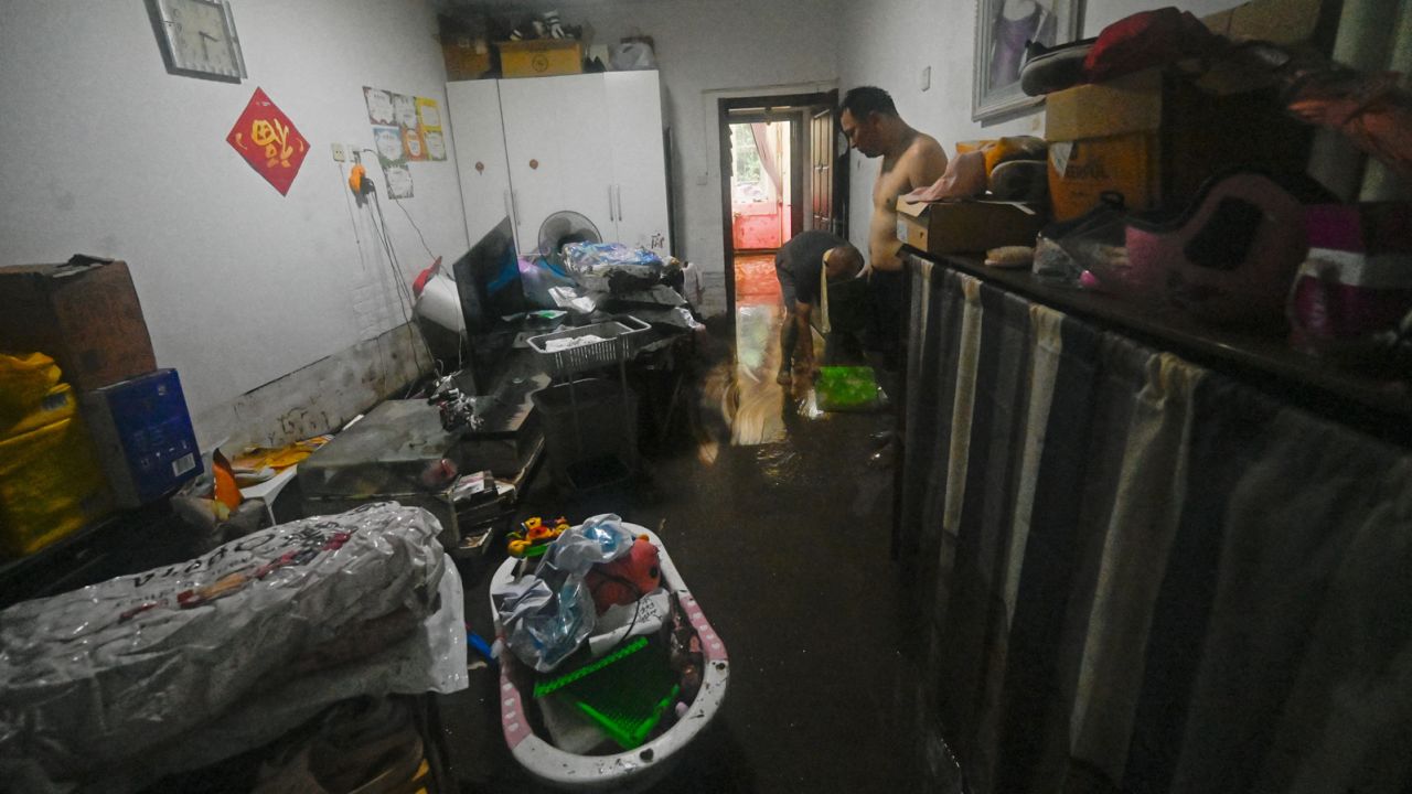 More than 52,000 people had to be evacuated from Beijing's Mentougou district as flood waters gushed into homes.