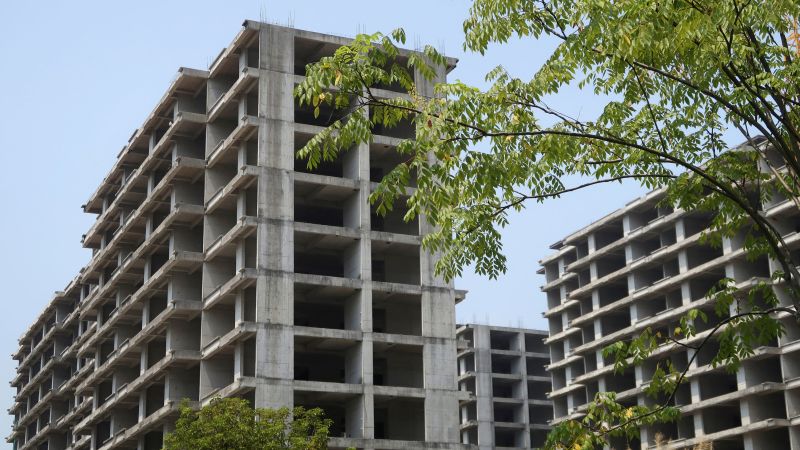 NextImg:Plunging sales of new homes show China's real estate crisis isn't over | CNN Business
