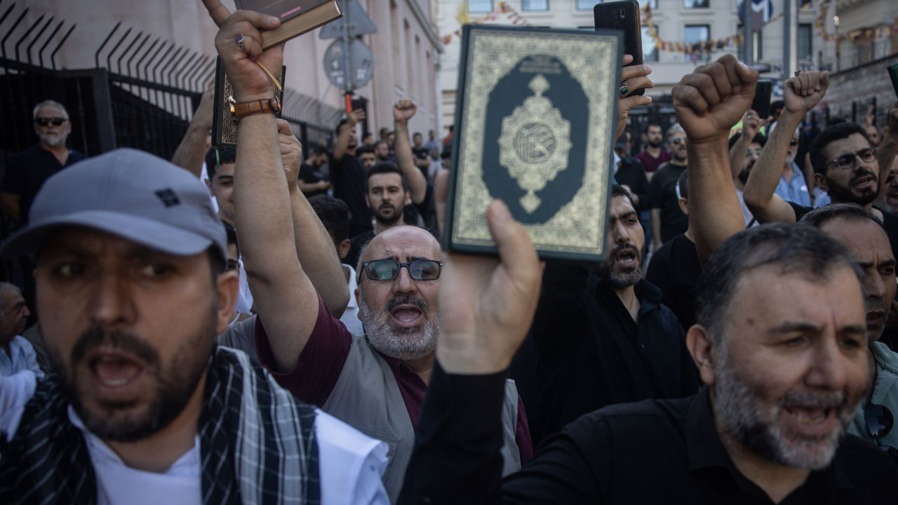 Protesters held copies of the Quran outside the Swedish Consultate in Istanbul, Turkey, on July 30, 2023.