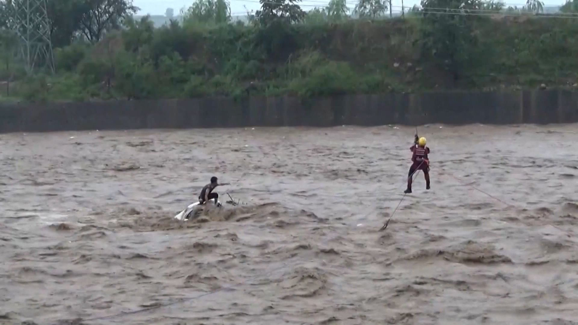 China's capital records heaviest rainfall of year as Doksuri tapers off, Weather News