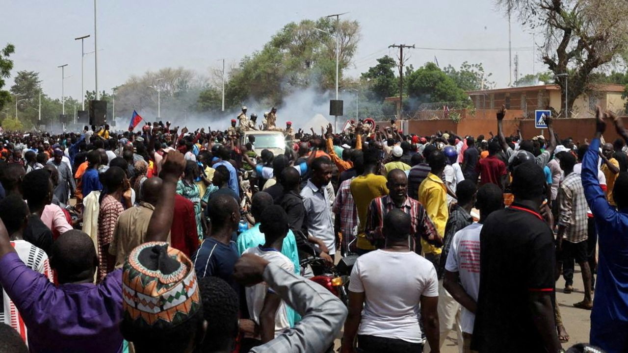 Nigerien security forces launch tear gas to disperse pro-junta demonstrators gathered outside the French embassy, in Niamey, the capital city of Niger July 30, 2023. REUTERS/Souleymane Ag Anara/File Photo