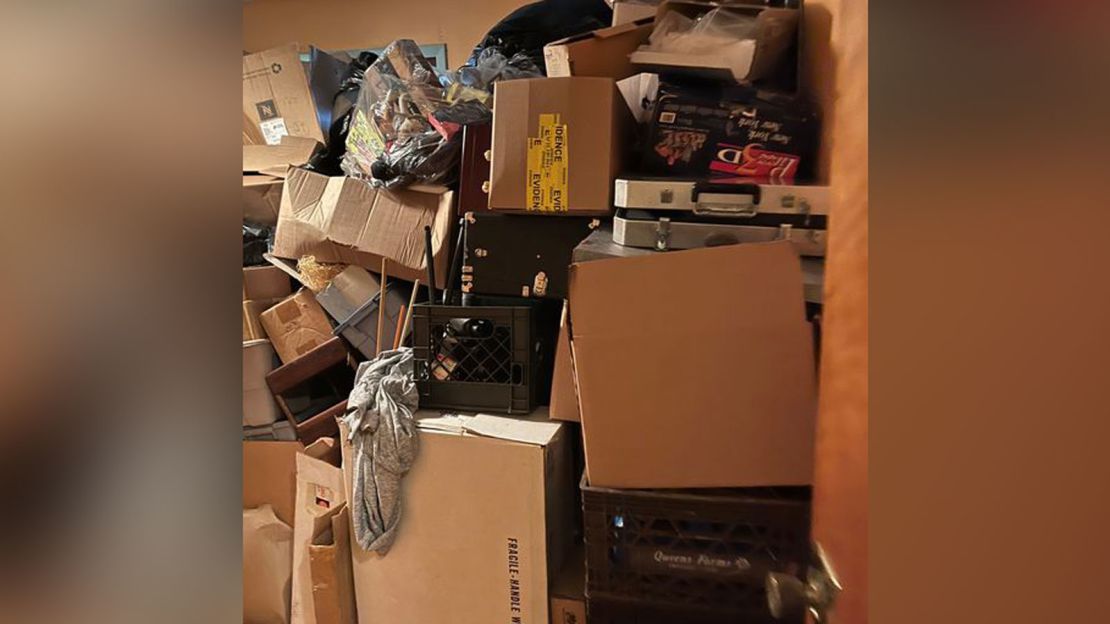 Boxes were piled up inside the home after the search, leaving the family little room to move.