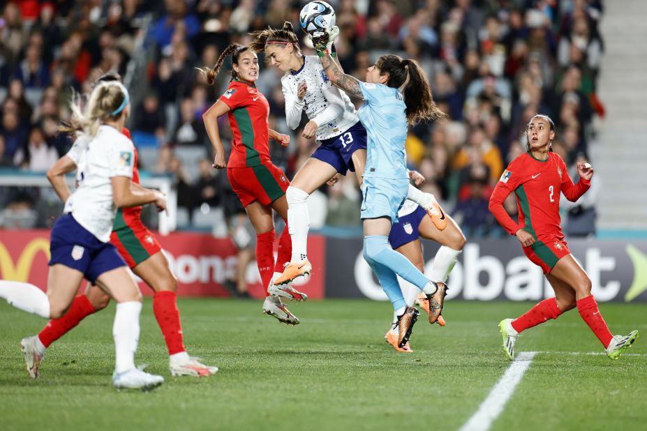 US forward Alex Morgan collides with Portuguese goalkeeper Inês Pereira in the first half.