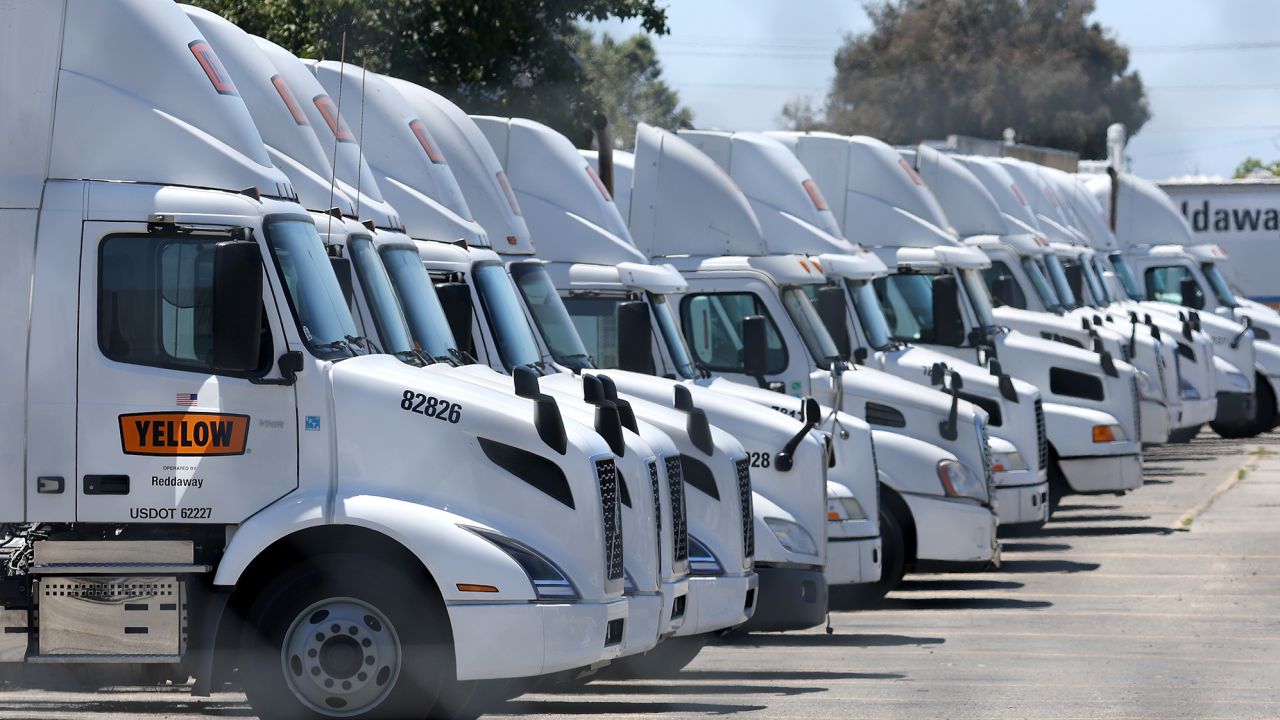 Yellow Corp. trucks sit idle at a company facility on Monday after the Teamsters union said the company has closed operations. The closure will cost 30,000 jobs, including those of 22,000 Teamsters union members.