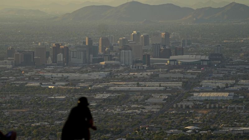 NextImg:Phoenix just endured the hottest month for any US city as historic heat streak comes to an end | CNN