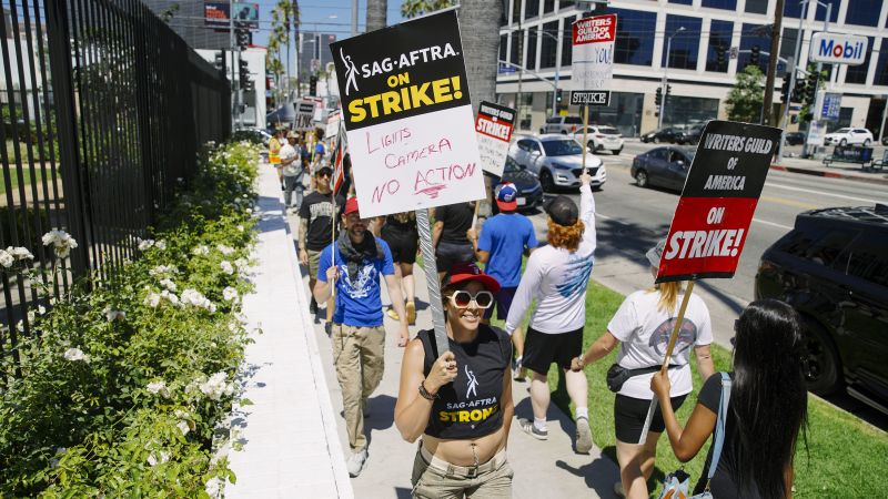 NextImg:Talks resume with aim to end strike by writers unions | CNN Business