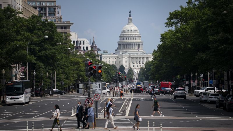NextImg:Fitch's historic downgrade may be a black eye for the US but not much more | CNN Business
