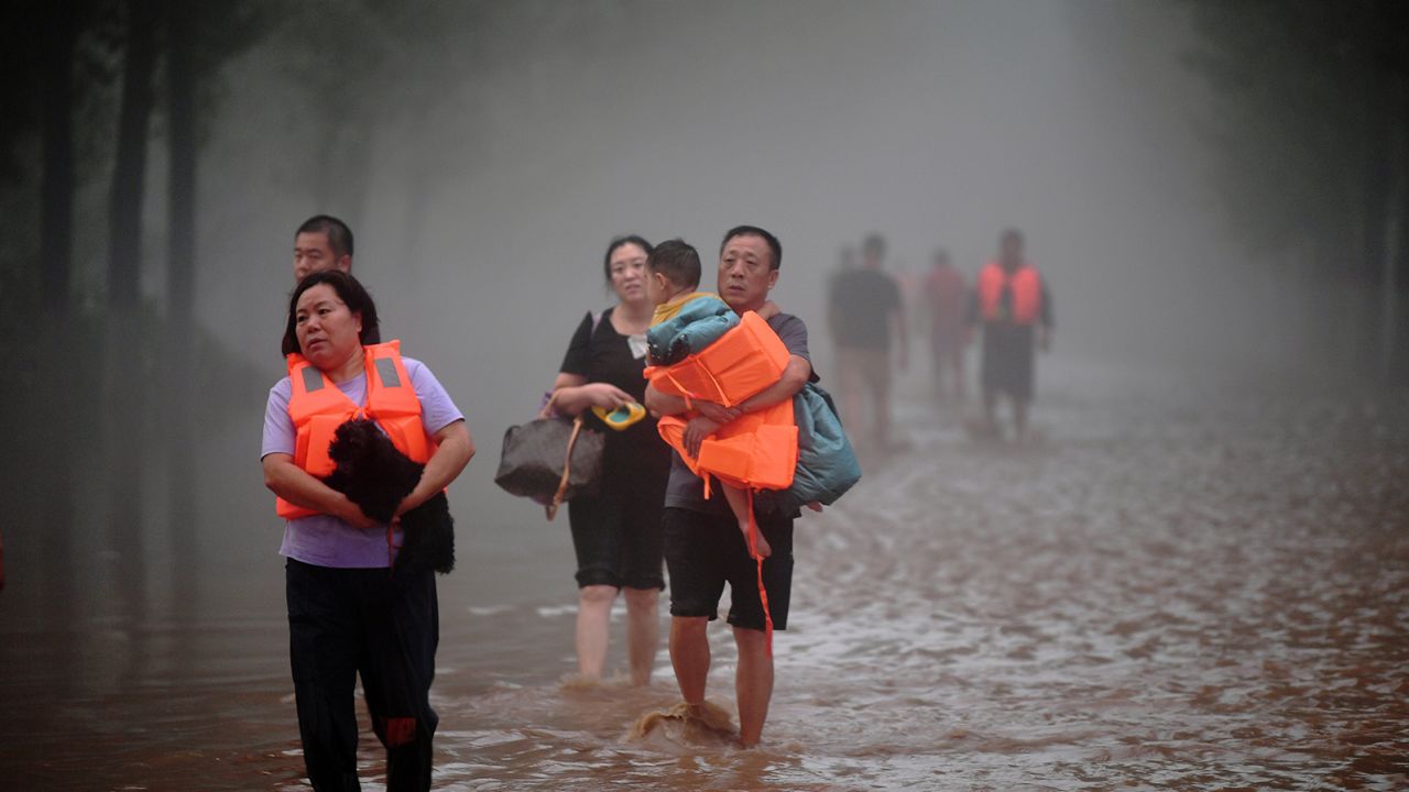 People evacuate Tazhao village in Zhuozhou city, Hebei province of China on August 1, 2023.