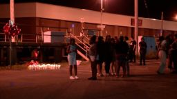 A vigil is held for a 14-month-old girl who died after being left in a hot car in Smithtown, New York. 