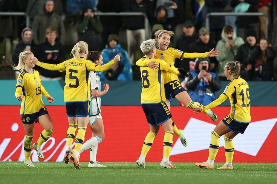 Sweden's Elin Rubensson celebrates after scoring from the penalty spot against Argentina on August 2. <a href=