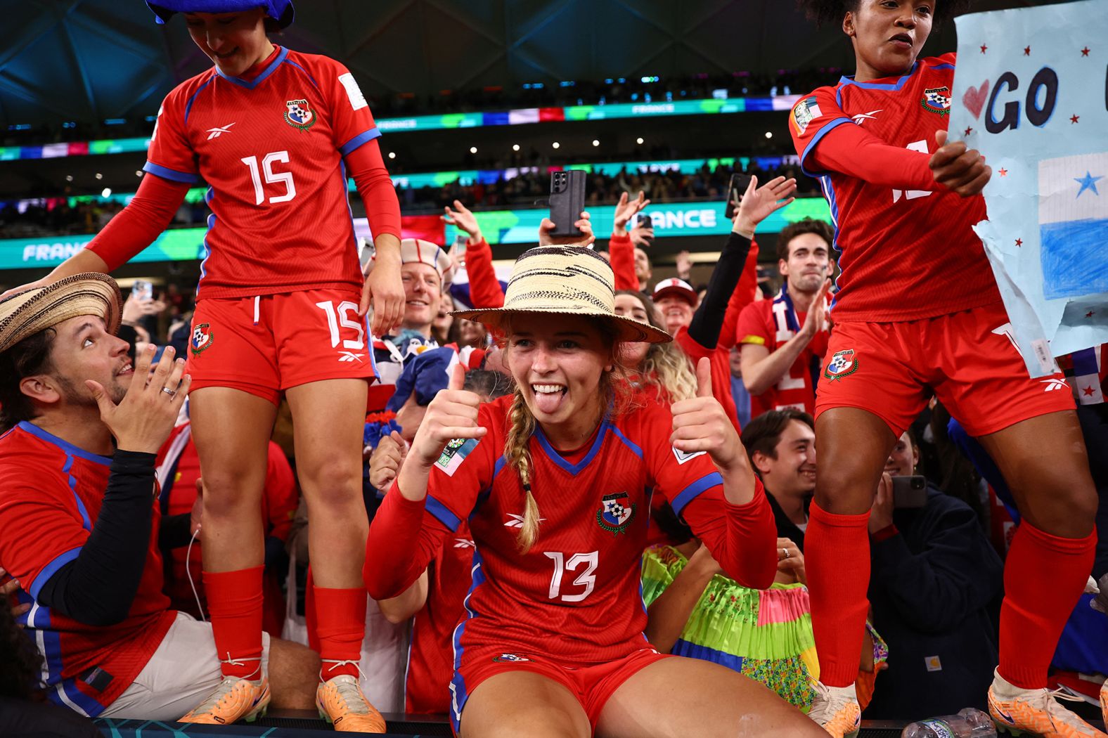 Panama players spend time with fans after the France match. This was Panama's first year playing at a Women's World Cup.