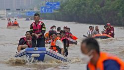 Residents evacuate on rubber boats through floodwaters in Zhuozhou in northern China's Hebei province, south of Beijing, Wednesday, Aug. 2, 2023. China's capital has recorded its heaviest rainfall in at least 140 years over the past few days. Among the hardest hit areas is Zhuozhou, a small city that borders Beijing's southwest. (AP Photo/Andy Wong)
