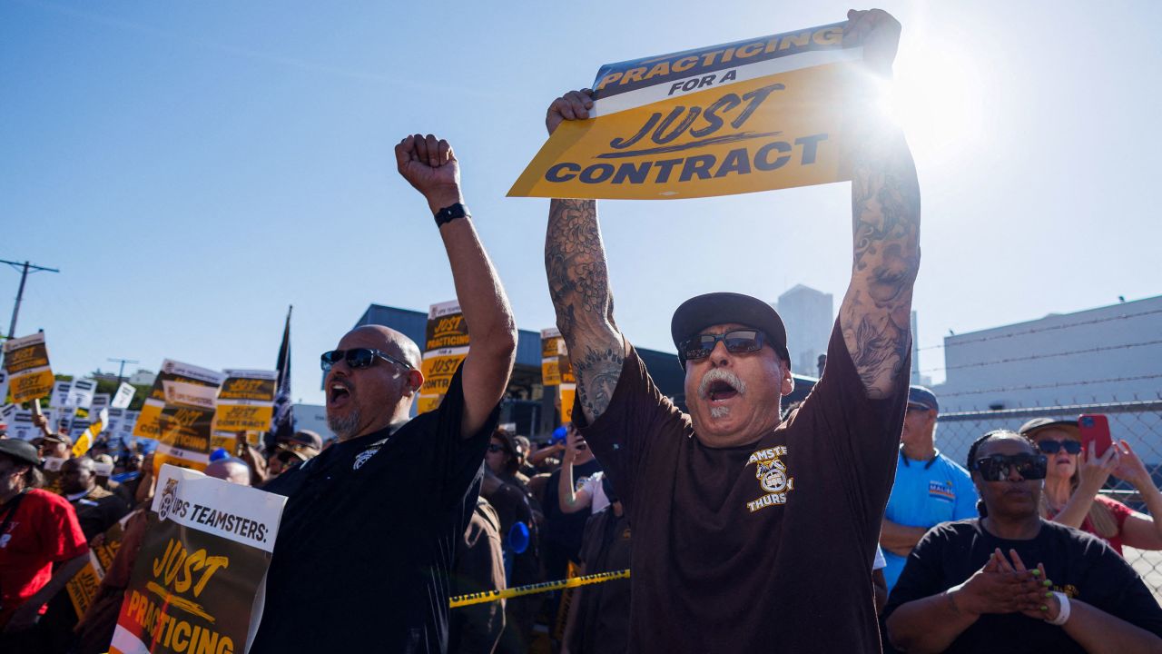 Teamster Sergio Martinez yells out during a rally on July 19, 2023, outside a UPS facility in downtown Los Angeles.