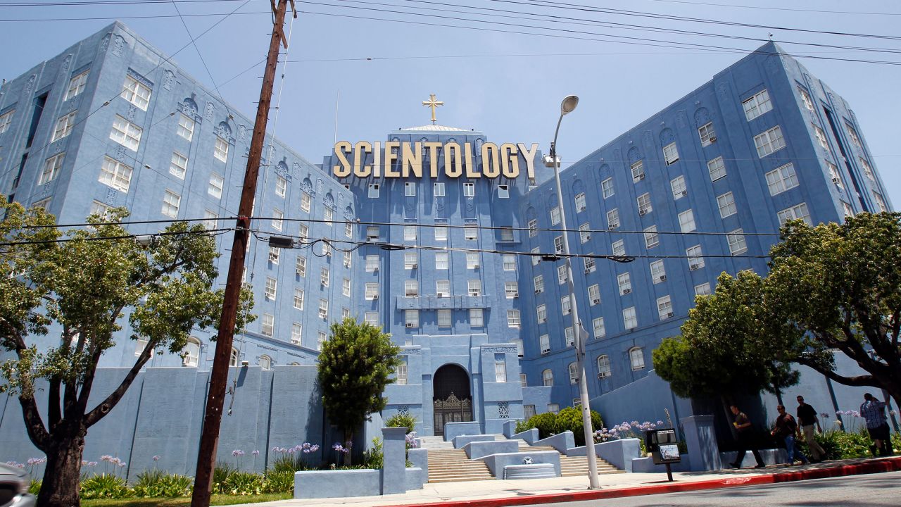 People walk past the Church of Scientology in Los Angeles in 2012.