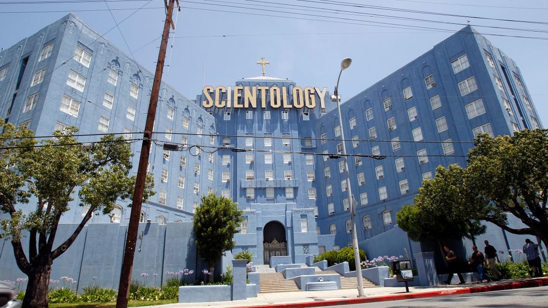 People walk past the Church of Scientology in Los Angeles in 2012.