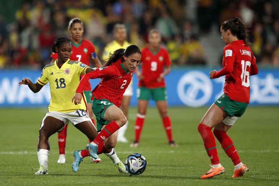 Colombian teenage star Linda Caicedo, left, challenges Morocco's Zineb Redouani during their final group match.