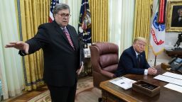 NYTVIRUS -President Donald Trump with Attorney General William Barr, make remarks before signsing an executive order in the Oval Office that will punish Facebook, Google and Twitter for the way they police content online, Thursday, May 28, 2020. ( Photo by Doug Mills/The New York Times)   