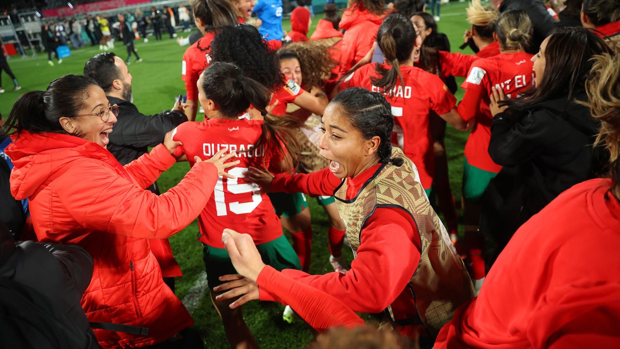 Morocco players celebrate reaching the last 16 of the Women's World Cup.