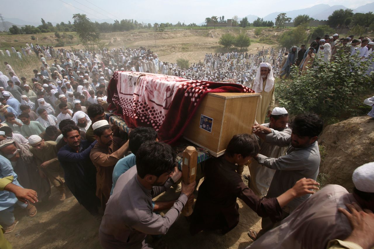 Mourners carry the casket of a victim who was killed in <a href="https://www.cnn.com/2023/07/30/asia/pakistan-blast-bajaur-intl/index.html" target="_blank">a suicide bomber attack</a> in the Bajur district of Khyber Pakhtunkhwa, Pakistan, on Monday, July 31. At least 54 people were killed in the bombing, which targeted a political convention organized by an Islamist party the previous day.