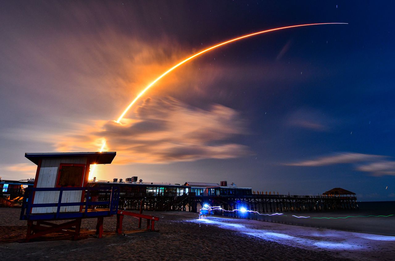 This long-exposure photo shows a SpaceX Falcon 9 rocket lifting off from Cape Canaveral, Florida, on Thursday, August 3. 