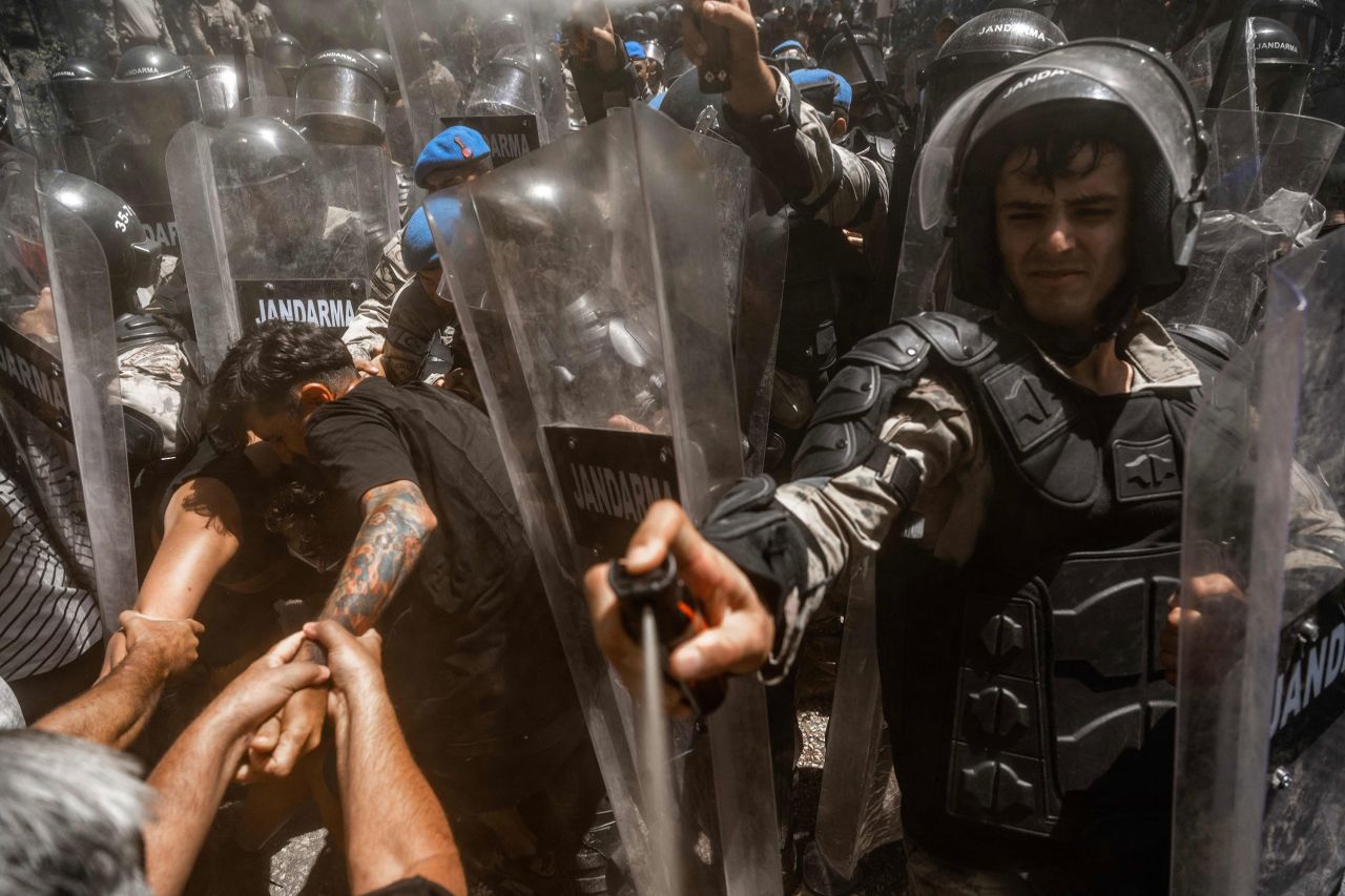 Turkish soldiers use pepper spray against demonstrators in Ikizkoy, Turkey, on Friday, July 28. This was the fifth day of protests against the deforestation of a century-old pine forest.
