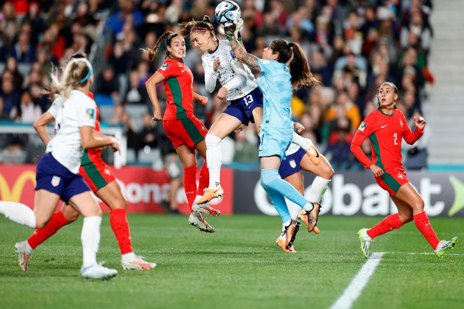 US forward Alex Morgan collides with Portugal's Inês Pereira as they go for the ball at the <a href=